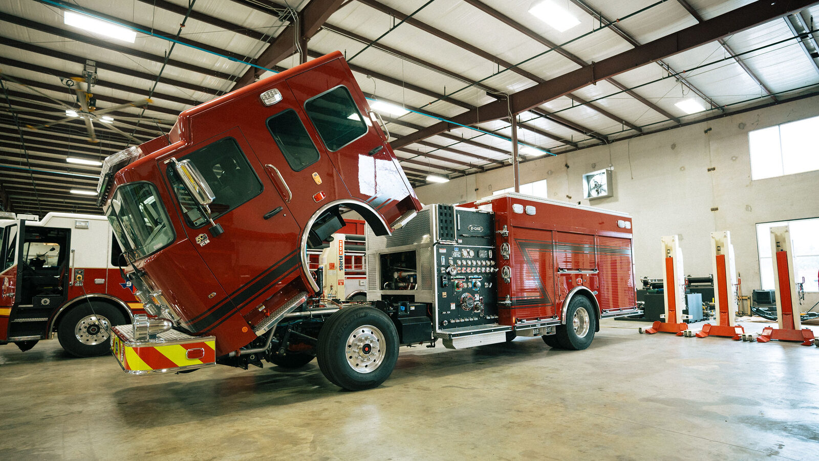 FESFAB technician working on a fire apparatus engine